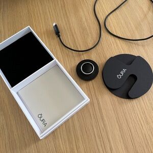 Oura Brushed Titanium Size 12. Excellent condition. Box & charger included.